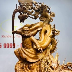 Đạt ma ngọa hổ tàng long gỗ hương.