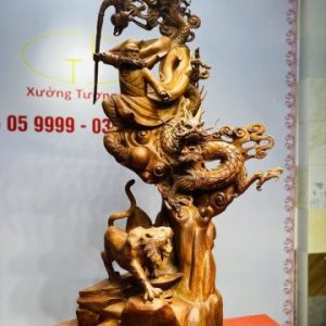 Đạt ma ngọa hổ tàng long gỗ hương.