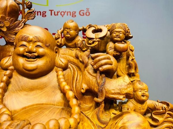 Di Lạc Cửu Tiểu vác cành đào ngồi bao tiền Gỗ Nu Hương