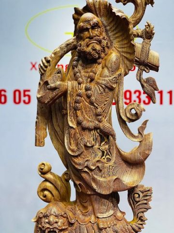 Đạt Ma Đứng Nghê Quá Hải Gỗ Mun Đuôi Công
