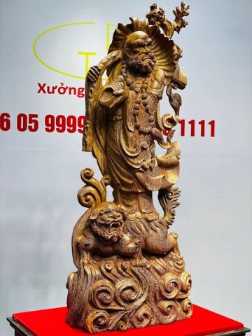 Đạt Ma Đứng Nghê Quá Hải Gỗ Mun Đuôi Công