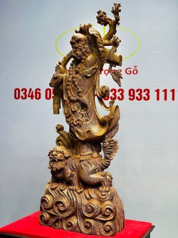 Đạt Ma Đứng Nghê Quá Hải Gỗ Mun Đuôi Công