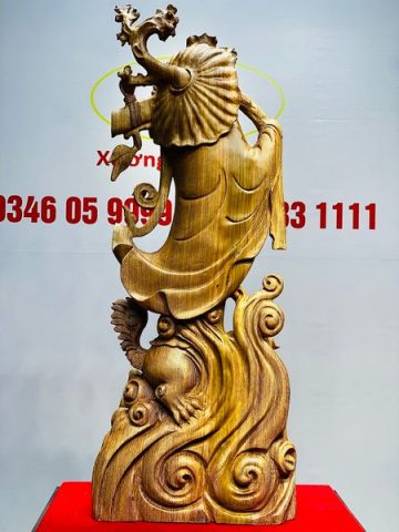 Đạt Ma Đứng Nghê Quá Hải Gỗ Mun Đuôi Công