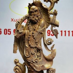Đạt Ma Đứng Nghê Quá Hải Gỗ Mun Đuôi Công