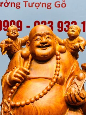 Di Lạc Cầm Gậy Như Ý Tam Tiểu Đứng Nghê Bao Tiền Gỗ Hương Đá