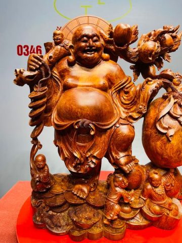 Di Lạc Ngũ Tiểu Vác Cành Đào Kéo Bao Tiền Gỗ Nu Hương