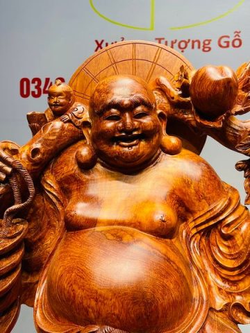 Di Lạc Ngũ Tiểu Vác Cành Đào Kéo Bao Tiền Gỗ Nu Hương
