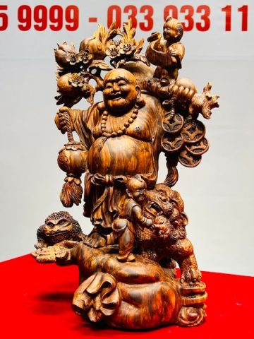 Di Lạc Nhị Tiểu Vác Cành Đào Đứng Bao Tiền Gỗ Sưa