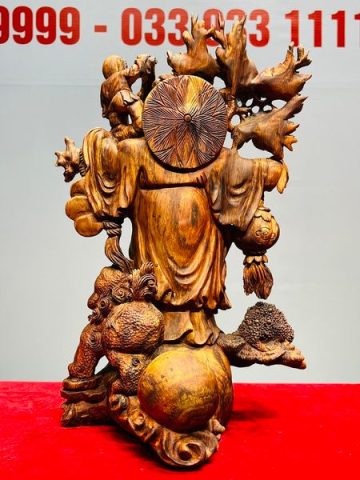 Di Lạc Nhị Tiểu Vác Cành Đào Đứng Bao Tiền Gỗ Sưa