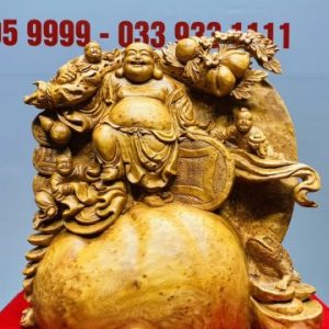 Di Lạc Tam Tiểu Vác Cành Đào Đứng Bao Tiền Gỗ Nu Ngọc Am