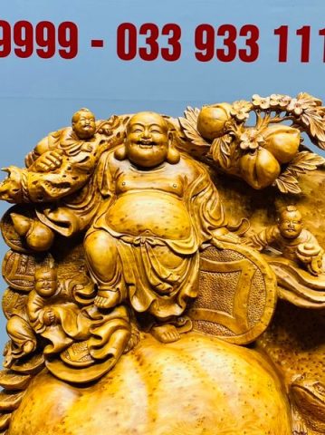 Di Lạc Tam Tiểu Vác Cành Đào Đứng Bao Tiền Gỗ Nu Ngọc Am