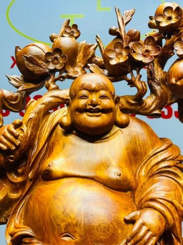 Di Lạc Vác Cành Đào Ngũ Tiểu Nhất Nghê Đứng Bao TIền Gỗ Nu Hương