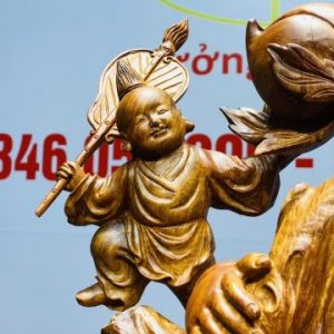 Di Lạc Vác Cành Đào Ngũ Tiểu Nhất Nghê Đứng Bao TIền Gỗ Nu Hương
