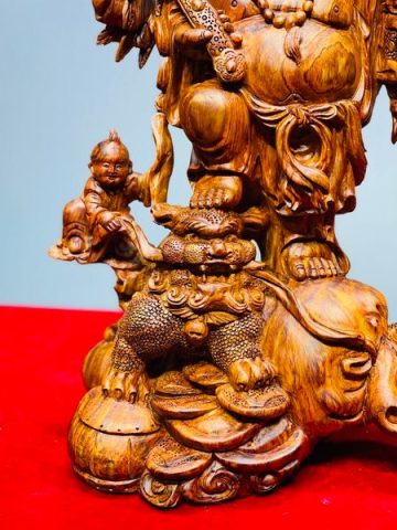 Di Lạc Nhị Tiểu Vác Cành Đào Đứng Bao Tiền Gỗ Sưa