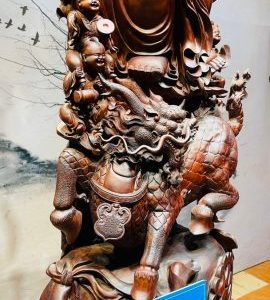 Di Lạc Cửu Tiểu Vác Cành Đào Nhất Long Lân Đứng Bao Tiền Gỗ Trắc