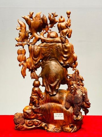 Di Lạc Vác Cành Đào Nhị Tiểu Nhất Nghê Đứng Bao Tiền Gỗ Sưa