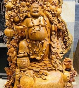 Di Lạc Vác Cành Đào Ngũ Phúc Đứng Bao Tiền Gỗ Nu Hương