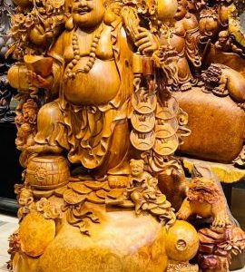 Di Lạc Vác Cành Đào Ngũ Phúc Đứng Bao Tiền Gỗ Nu Hương