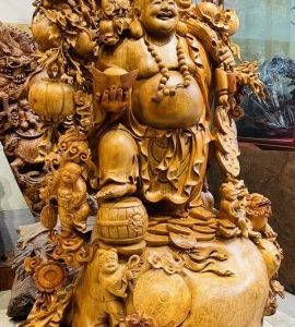 Di Lạc Vác Cành Đào Ngũ Phúc Đứng Bao Tiền Gỗ Nu Hương