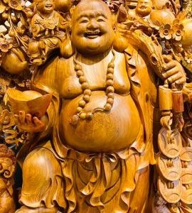 Di Lạc Vác Cành Đào Ngũ Phúc Đứng Bao Tiền Gỗ Nu Hương