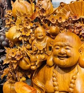 Di Lạc Vác Cành Đào Ngũ Phúc Đứng Bao Tiền Gỗ Nu Hương