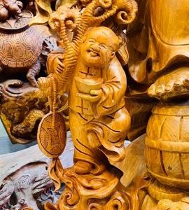 Di Lạc Vác Cành Đào Ngũ Phúc Đứng Bao Tiền Gỗ Nu Hương