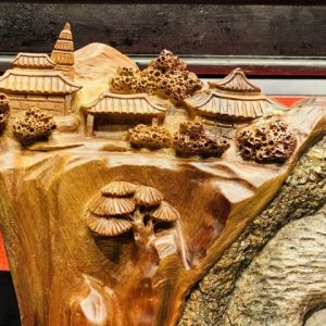 Thành Tâm Bái Phật Gỗ Hương Ôm Đá Tự Nhiên
