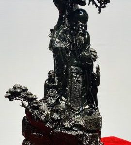 Ông Thọ Đứng Tùng Gỗ Mun Sừng