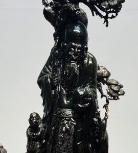 Ông Thọ Đứng Tùng Gỗ Mun Sừng