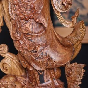 Đạt Ma Đứng Nghê Quá Hải Gỗ Mun Đuôi Công