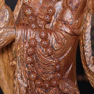 Đạt Ma Đứng Nghê Quá Hải Gỗ Mun Đuôi Công