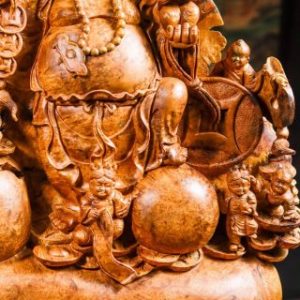Di Lặc cửu tiểu vác đào gỗ nu hương.