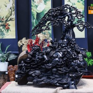 Di lặc ngồi gốc tùng gỗ mun