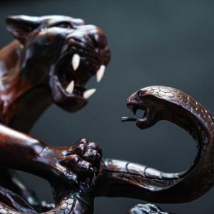 Báo săn mồi gỗ trắc Báo săn mồi gỗ trắc