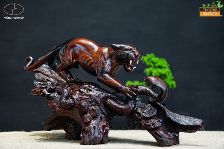 Báo săn mồi gỗ trắc Báo săn mồi gỗ trắc