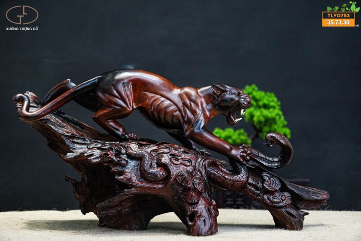 Báo săn mồi gỗ trắc Báo săn mồi gỗ trắc