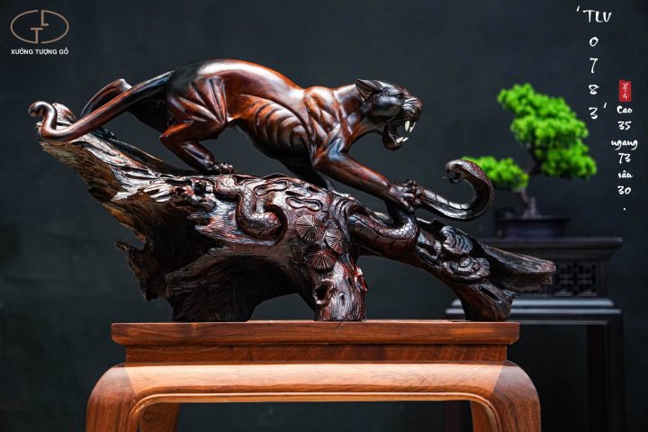 Báo săn mồi gỗ trắc Báo săn mồi gỗ trắc
